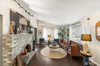 A light filled home featuring large windows that create an open, airy atmosphere.