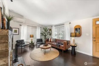 The generously sized living room provides an inviting space for gatherings and everyday living.