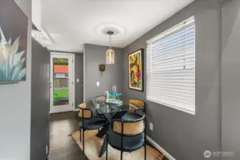 A charming, dedicated dining nook just off the kitchen, perfect for casual meals and morning coffee.