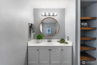 Designer paint color compliments this bathroom.