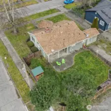 Aerial view of this well maintained home located on a corner lot.
