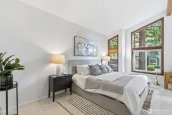 The primary bedroom has cathedral ceilings.