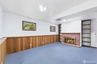 The fireplace downstairs is wood burning.