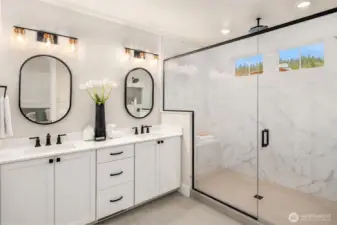 Spa-inspired primary bathroom with dual vanity, quartz counters, and modern fixtures.
