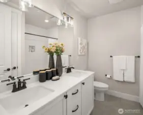 Well-appointed guest bathroom featuring contemporary fixtures and clean design.