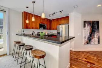 Chef’s Kitchen with Casual Seating for Four—Perfect for Gathering While You Cook.