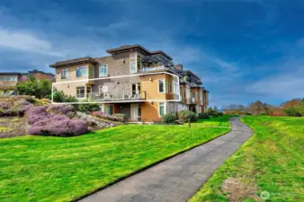 This home lives large. Note the outline of its private, end unit, spacious footprint.