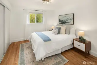 Bedroom 3 with more great hardwood floors and good natural light.