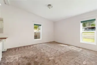 Primary bedroom is also spacious and vaulted with lots of natural light