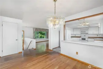Alternate view of the dining room highlights the convenient pass-through to the kitchen.