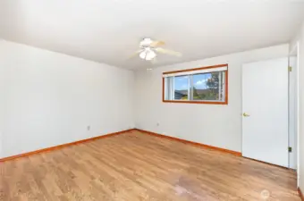 Primary features a large window, ample sized closet, ceiling fan and en-suite bathroom.