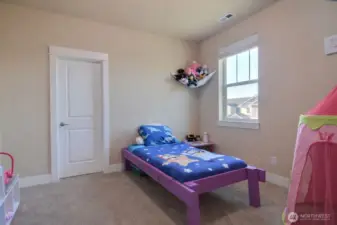 Bedroom Two. Plenty of room, door on the back wall leads to a walk-in closet.