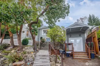 Terraced front for easy maintenance. Separate She-Shed provides a separate fun office space or storage area.