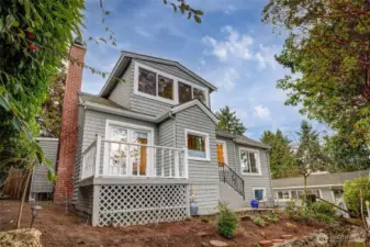 Original French doors lead from the living room to the western facing patio