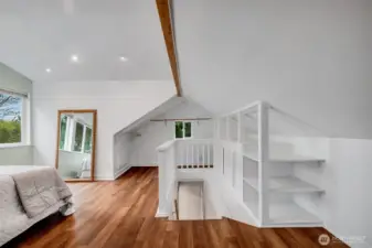 Upstairs loft bedroom faces West and has a breathtaking view and plenty of built in storage