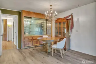 Another dining space with built in buffet in the family room ~
