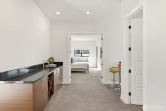 Head upstairs and enjoy wet bar near primary bedroom. Perfect coffee station to start the morning!