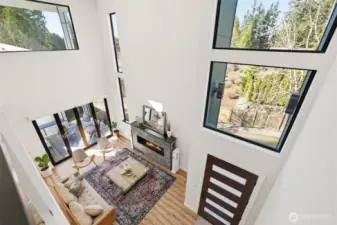 Walls of windows flood the home with natural light!