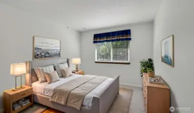 Guest bedroom #1 on the upper floor. **This image has been virtually staged**