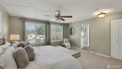 Custom blinds and 3 closet spaces.