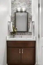 Dream Bar Harbour glass tile accent wall in powder room