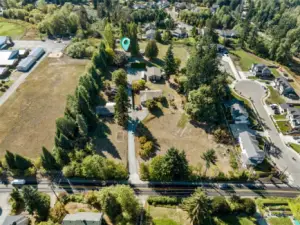 Lot is to the Right of the blue dot, Shared Private driveway.