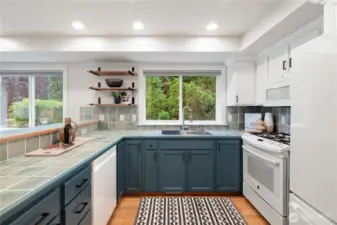 A well laid out kitchen with new Bosch Dishwasher, ne GE Fridge