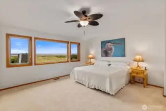 Primary bedroom with sweeping ocean views