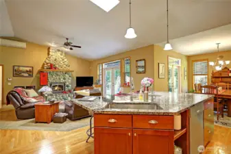 Chef’s view of Great room, dining room and French doors from both area to the spacious deck.