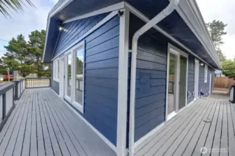Wrap around deck with handicap ramp to the back door.