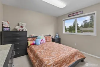 Located upstairs as well, Bedroom 3 offers views of the front yard and plenty of space to enjoy.
