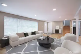 Huge windows flood the room with light