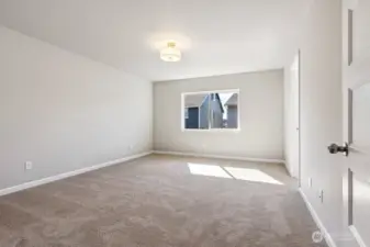 **Photos of simlar floorplan in another community. Features and specs will vary**