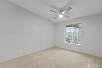 The Dining Room has vaulted ceilings and is large enough to house a 10-12 person dining room table and a Sideboard Cupboard or China Cabinet with all that wall space.  Only 1 big window but it still filters in a lot of light through into the space, among other things. Free window film with a full-price offer!