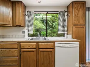 KITCHEN WITH VIEW TO REAR YARD & DECK