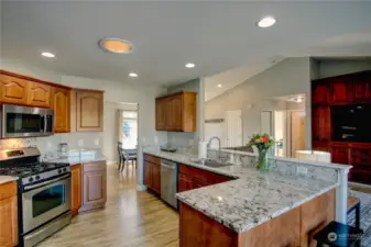 Kitchen looking back towards dining room and 2nd &l 3rd bedroom area.