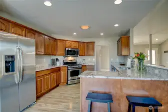 Kitchen area with eating bar.