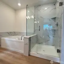 Primary shower + relaxing soaker tub