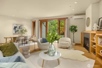 The openness of the great room provides easy living and nice connection between all the living spaces. This side is large enough to accommodate a 2nd seating area, desk, or shelving along the back wall (behind the photographer in this shot) should you wish.