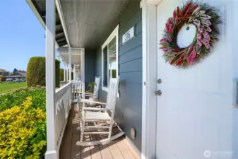 Covered front porch is perfect for relaxing.