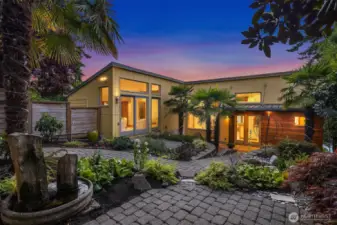 Here is the courtyard, which represents the main access of the home. To your left you can see the door to the family room.