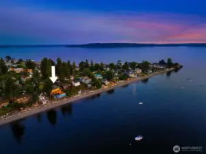 Perspective of the home along the Three Tree Point shoreline.