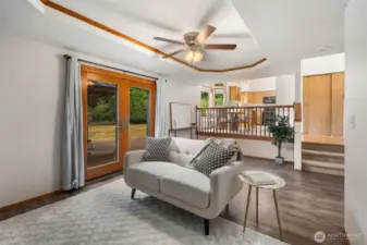 family room w/ French doors to outdoor deck