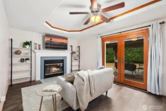 family room w/ French doors to outdoor deck