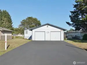 Full Asphalt Driveway leading to the 2-car Garage.