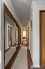 Hallway leading to the bedrooms and bathrooms.
