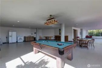 Having a party or event?  This is the community rec room. Tables, chairs,bar and kitchen.