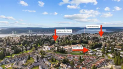 This view captures how close in proximity these conveniences are, the waterfront, Highlands Golf Course, and the nearby elementary school, all just a moment away.