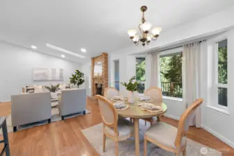 Windows surround the dining and living areas.