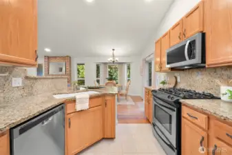 Granite countertops throughout the kitchen.